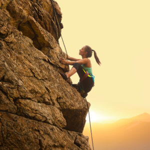woman rock climbing